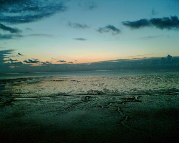 Sonnenuntergang bei Ebbe an der Nordsee bei Dorum am 2.8.06 um 21:44 Uhr.